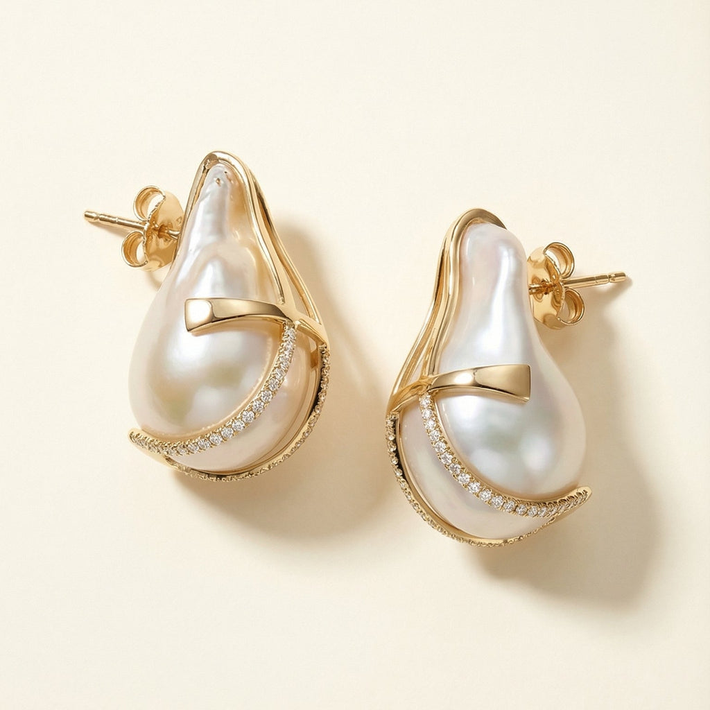 Pearl earrings with gold accents on a beige background